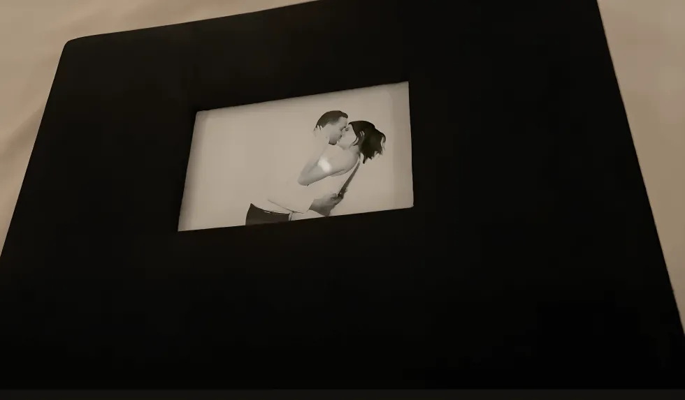 Memory guestbook with black and white photo booth prints